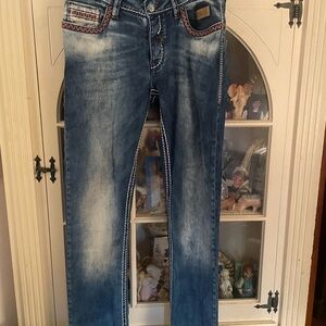 Slim Blue Jeans with Faded Wash and Distressed Look